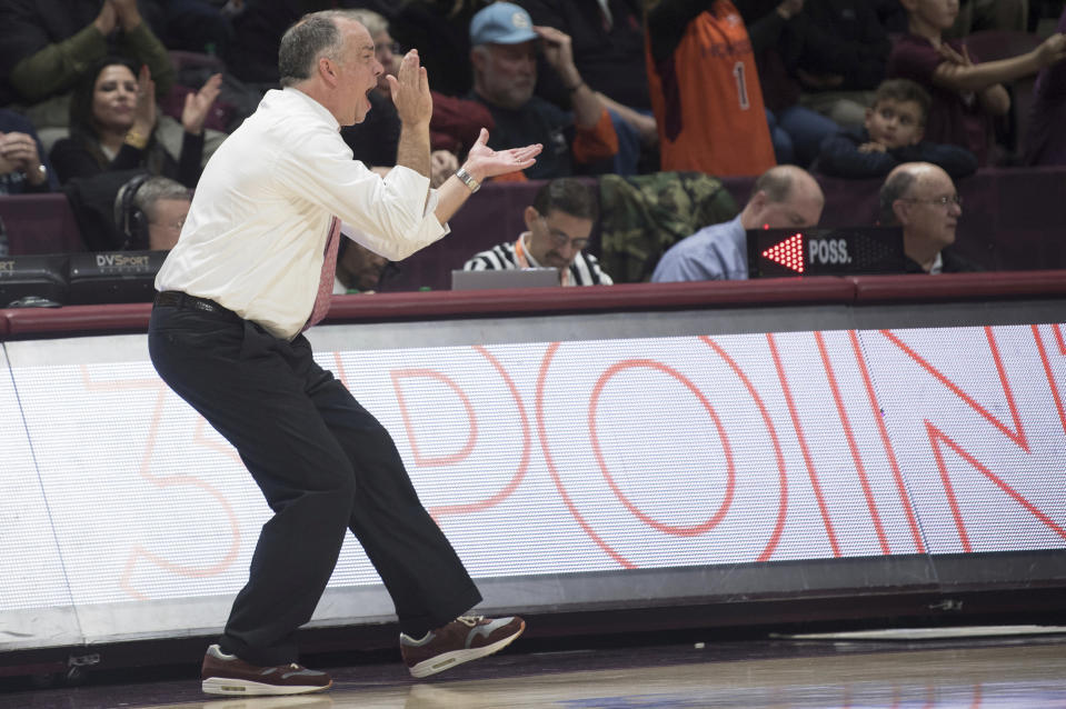 Virginia Tech head coach Mike Young cheers on his team against North Carolina during the second half of an NCAA college basketball game against North Carolina in Blacksburg, Va., Wednesday, Jan. 22, 2020.(AP Photo/Lee Luther Jr.)