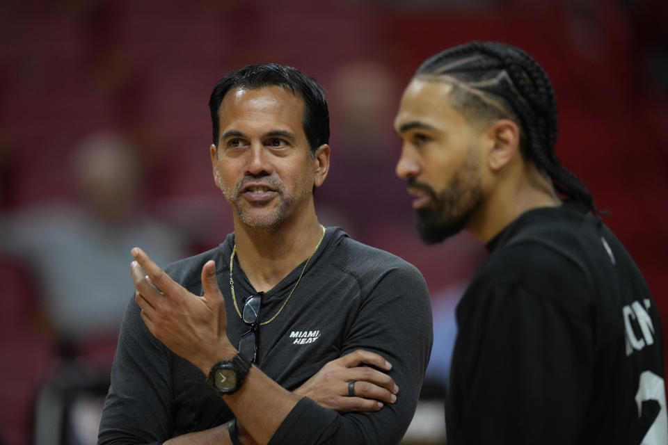 Miami Heat head coach Erik Spoelstra, left, talks with Miami Heat guard Gabe Vincent during a practice ahead of Game 3 of the NBA Finals, at the Kaseya Center in Miami, Tuesday, June 6, 2023. (AP Photo/Rebecca Blackwell)