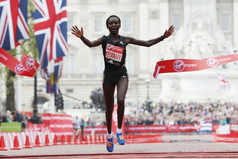 Kenya's Mary Keitany wins the London Marathon with an unofficial time of 2hrs 17min 01sec