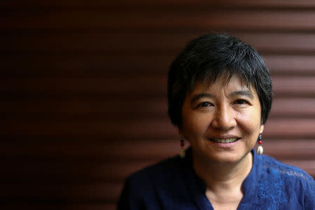 Joan Carling, a prominent indigenous rights activist from the Kankanaey tribe of the northern Philippines' Cordillera region poses for a photo before an interview with the Thomson Reuters Foundation at a hotel in Bangkok, Thailand, October 20, 2016. REUTERS/Athit Perawongmetha