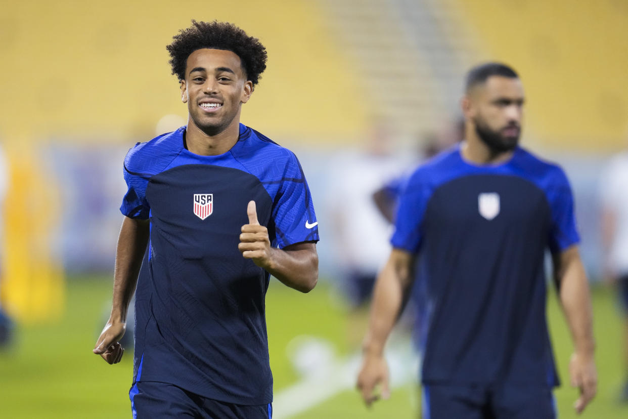 Tyler Adams, left, and Cameron Carter-Vickers, both of the United States participate in an official training session on the eve of the group B World Cup soccer match between England and the United States at Al-Gharafa SC Stadium, in Doha, Thursday, Nov. 24, 2022. (AP Photo/Ashley Landis)