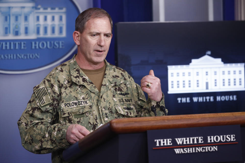 FILE - In this April 5, 2020, file photo, Navy Rear Adm. John Polowczyk, supply chain task force lead at the Federal Emergency Management Agency, speaks during a coronavirus task force briefing at the White House in Washington. U.S. officials are invoking a rarely used provision of American law that would shield companies from antitrust regulations to help the country from again running out of medical supplies in a pandemic. Polowczyk, who was appointed to run a White House supply chain task force in response to the outbreak, told reporters last week that the government is expanding the emergency stockpile of critical supplies and medicines managed by the Department of Health and Human Services. (AP Photo/Patrick Semansky, File)