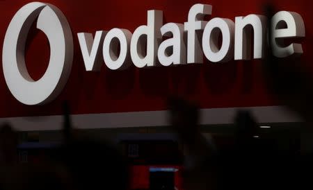 FILE PHOTO: The Vodafone logo is seen at the Mobile World Congress in Barcelona, Spain, February 28, 2018. REUTERS/Sergio Perez