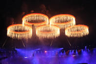 The Olympic rings light up the stadium during the Opening Ceremony of the London 2012 Olympic Games at the Olympic Stadium on July 27, 2012 in London, England. (Photo by Ian MacNicol/Getty Images)