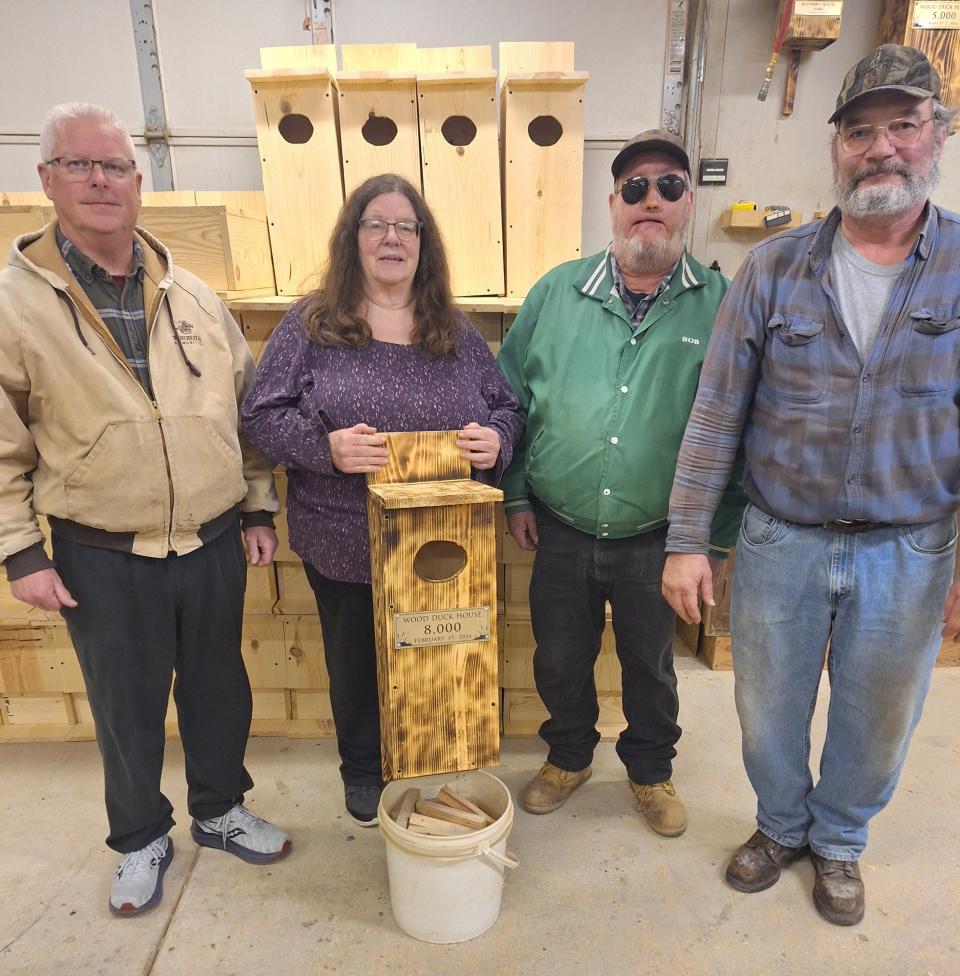 This group of builders assembled wood duck house No. 8,000 Feb. 19. Left to right: Eric Johnson-Green Bay Chapter of Delta Waterfowl Association, Lynn Robinson-Green Bay Duck Hunters, Bob Schuh-Manitowoc County Fish and Game Protective Association, and Bill Mecha-Maribel Sportsmen’s Club show wood duck house 8,000.