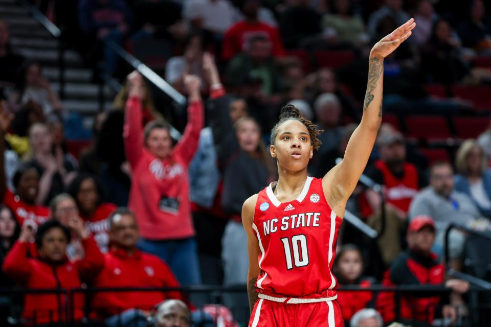 PORTLAND, OREGON - MARCH 29: Aziaha James #10 of the NC State Wolfpack reacts after making a three point basket during the second half against the Stanford Cardinal in the Sweet 16 round of the NCAA Women's Basketball Tournament at Moda Center on March 29, 2024 in Portland, Oregon. (Photo by Steph Chambers/Getty Images) ORG XMIT: 776106200 ORIG FILE ID: 2123787568