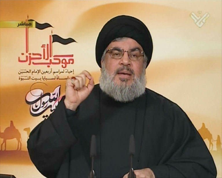 An image from Hezbollah's Al-Manar TV shows Hezbollah chief Hassan Nasrallah addressing Shiite Muslims gathered for Arbaeen, on January 3, 2013 in Lebanon. War-torn Syria is threatened with "schemes of division and partition", Nasrallah said in a televised speech