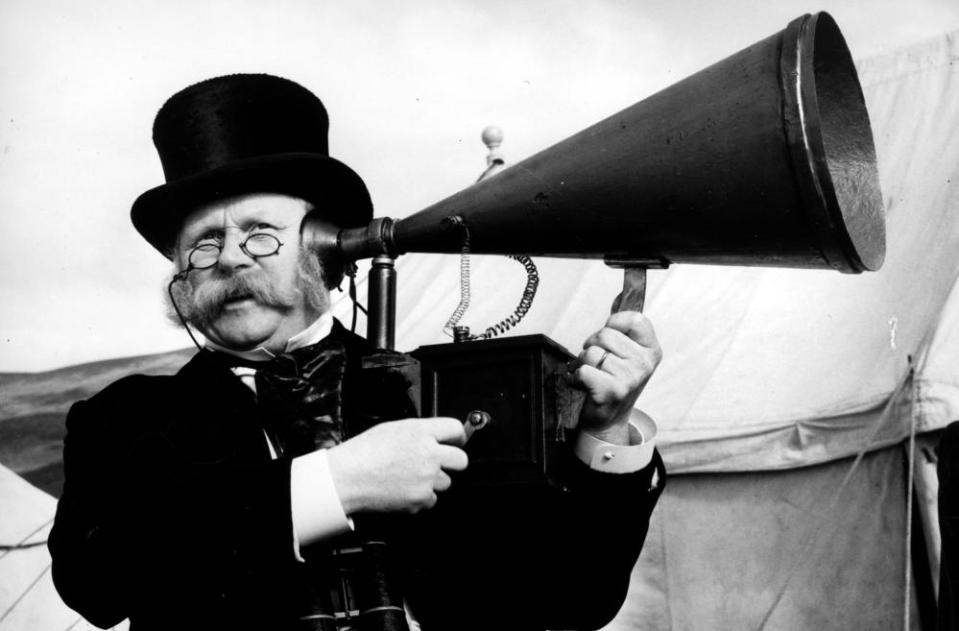 Gert Froebe in Jules Verne’s Rocket to the Moon (1967) a man uses an ear trumpet, listening device