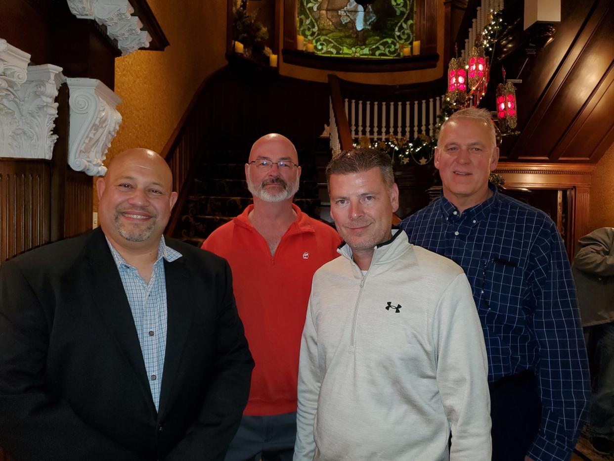 Mahoning County Fire Chiefs Association officers, pictured at the group's recent Christmas Party at Sebring Mansion Inn and Spa, will remain in their jobs for 2023. Officers are, front row from left, Vice President J.R. Warren, Coilsville Fire chief, and treasurer Mike Springer, Sebring Fire chief; and, back row from left, Secretary Larry Sauerwein, Beaver Township Fire chief, and president Todd Baird, Green Township Fire chief.