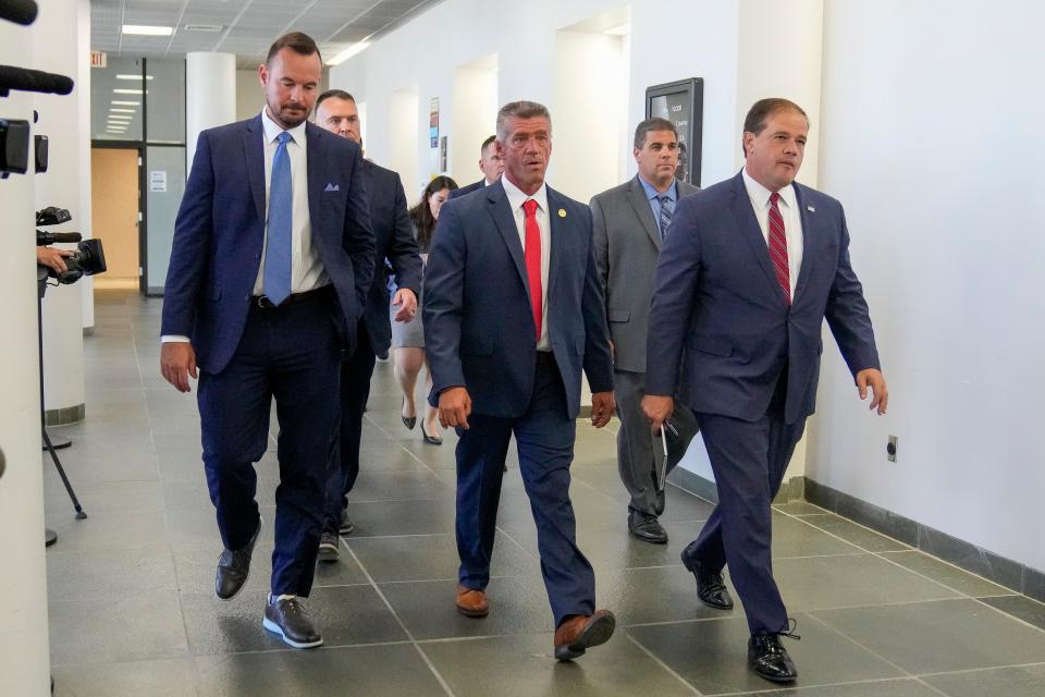 Suffolk County District Attorney Ray Tierney, right, arrives for a court appearance in the case against Rex Heuermann (AP)