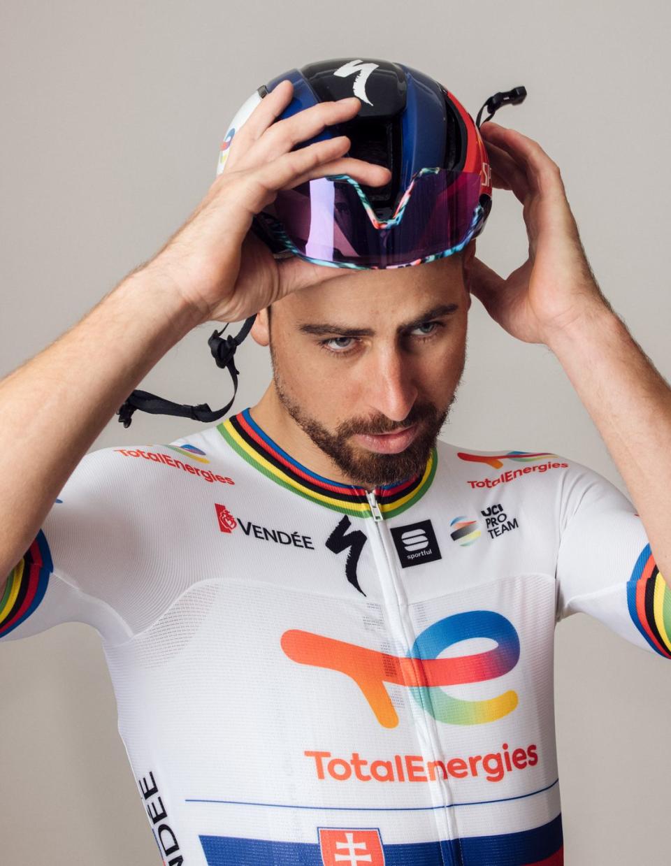 peter sagan poses for a portrait wearing a helmet