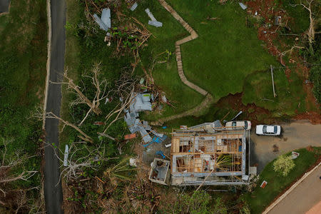 The contents of a damaged home can be seen as recovery efforts continue following Hurricane Maria near the town of Comerio, Puerto Rico, October 7, 2017. REUTERS/Lucas Jackson