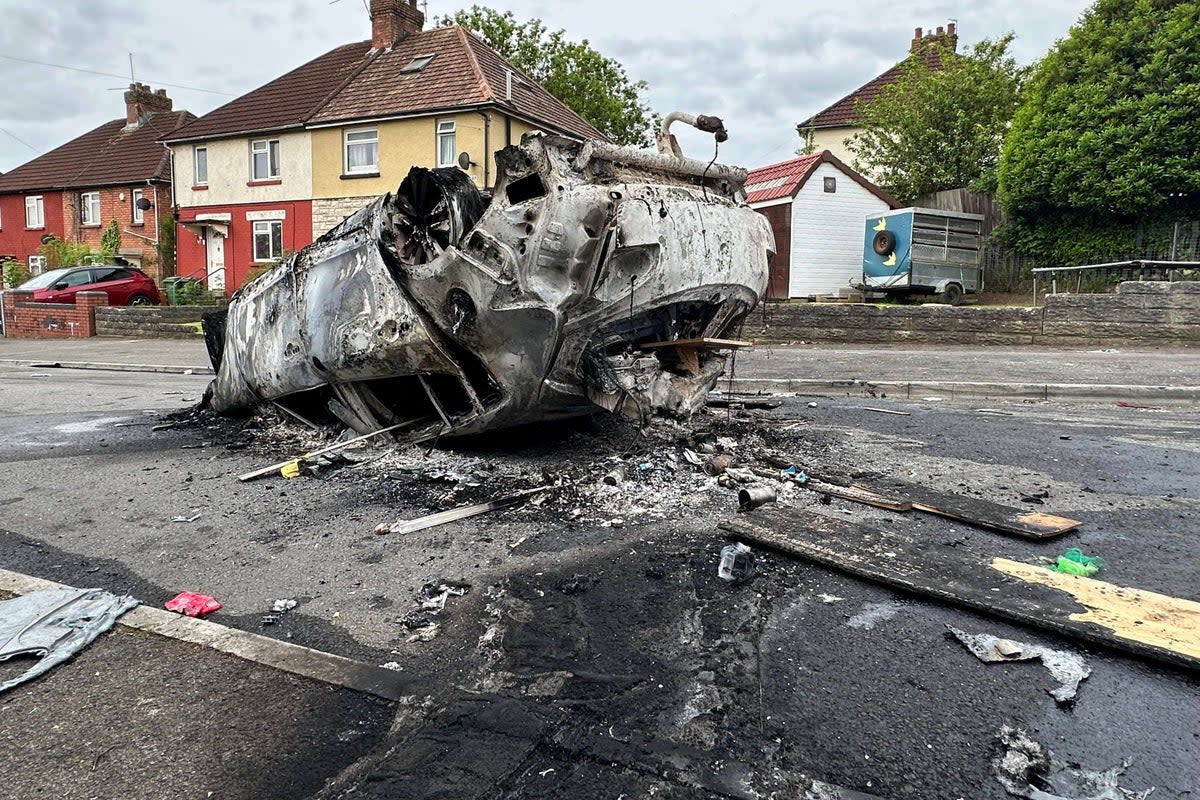 At least two cars were torched as trouble involving scores of youths flared for hours (PA Wire)