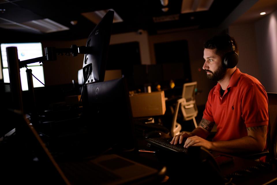 Ryan Faust, information technology engineer, works in the Network Operations Center at TenHats, 550 Fort Summit Way, in Knoxville, Tenn. on Friday, June 17, 2022. The IT company specializes in a broad range of technology services including data storage, as well as having the region's first carrier-neutral colocation center in 20 years.