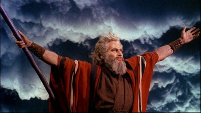 Charlton Heston as Moses in the film "The Ten Commandments," seen parting the Red Sea with the iconic staff of Moses. [Photo provided]