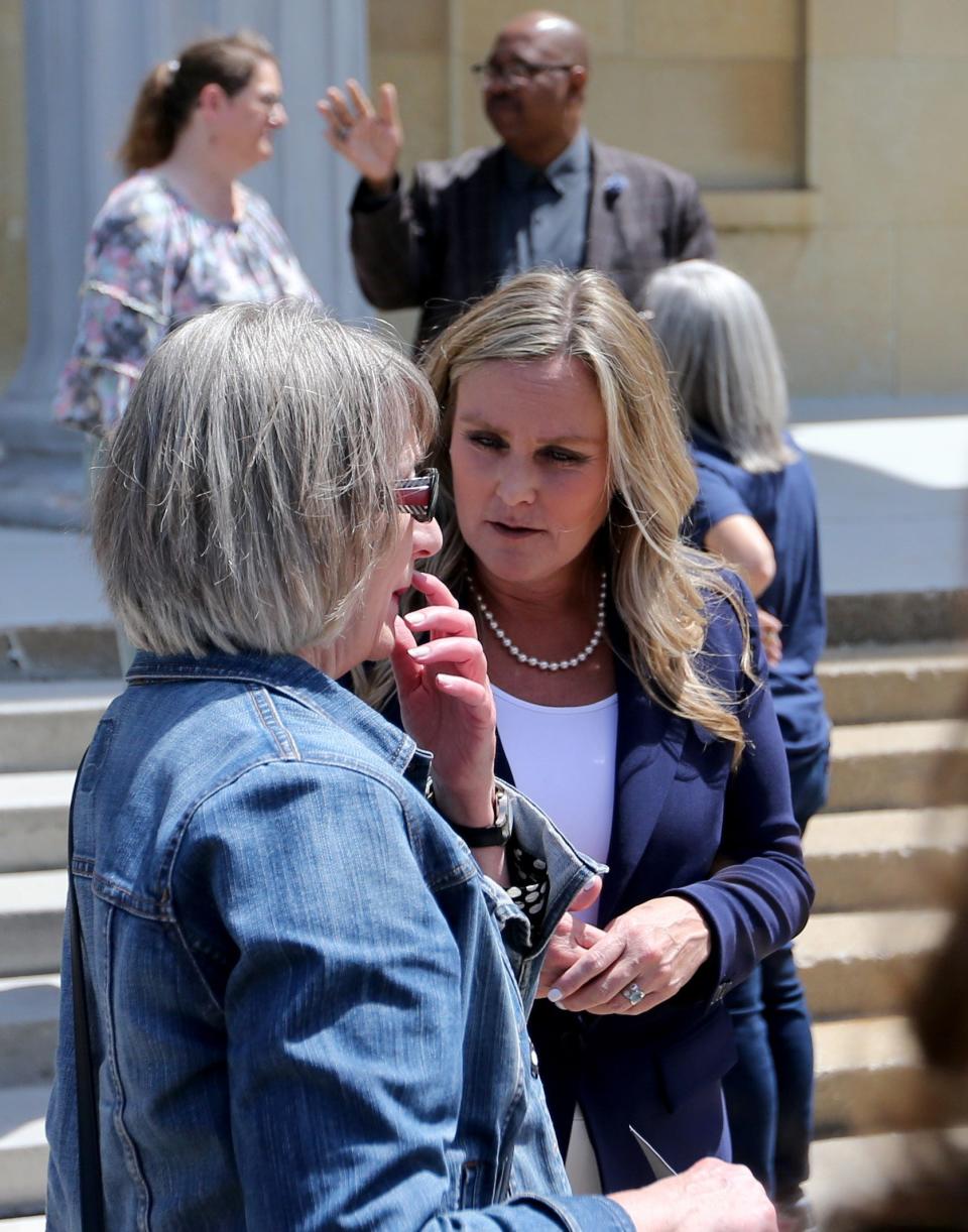 Jennifer McCormick speaks with Diana Hess, chair of the St. Joseph County Democratic Party, on the steps of the 1855 Courthouse Friday, May 5, 2023, during a stop in downtown South Bend after McCormick's announcement that she is running as a Democrat for governor in Indiana.