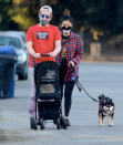 <p>Macaulay Culkin and girlfriend Brenda Song take their cat and dog out for a walk in L.A. on Tuesday.</p>