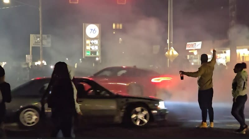 Hundreds of people were part of a street racing takeover on NE Glisan in Portland, April 14, 2024 (KOIN)