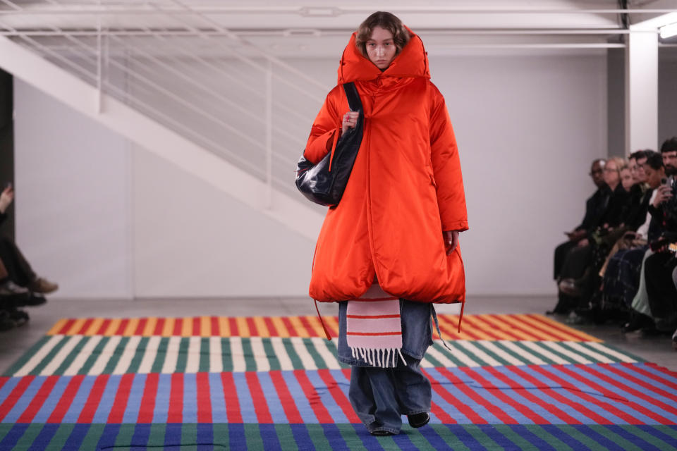 A model wears a creation as part of the Sunnei women's Fall-Winter 2024-25 collection presented in Milan, northern Italy, Friday, Feb. 23, 2024. (AP Photo/Luca Bruno)