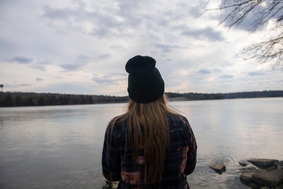 Kasey Tyndall fishes at Old Hickory Pier in Old Hickory , Tenn., Friday, Feb. 10, 2023.