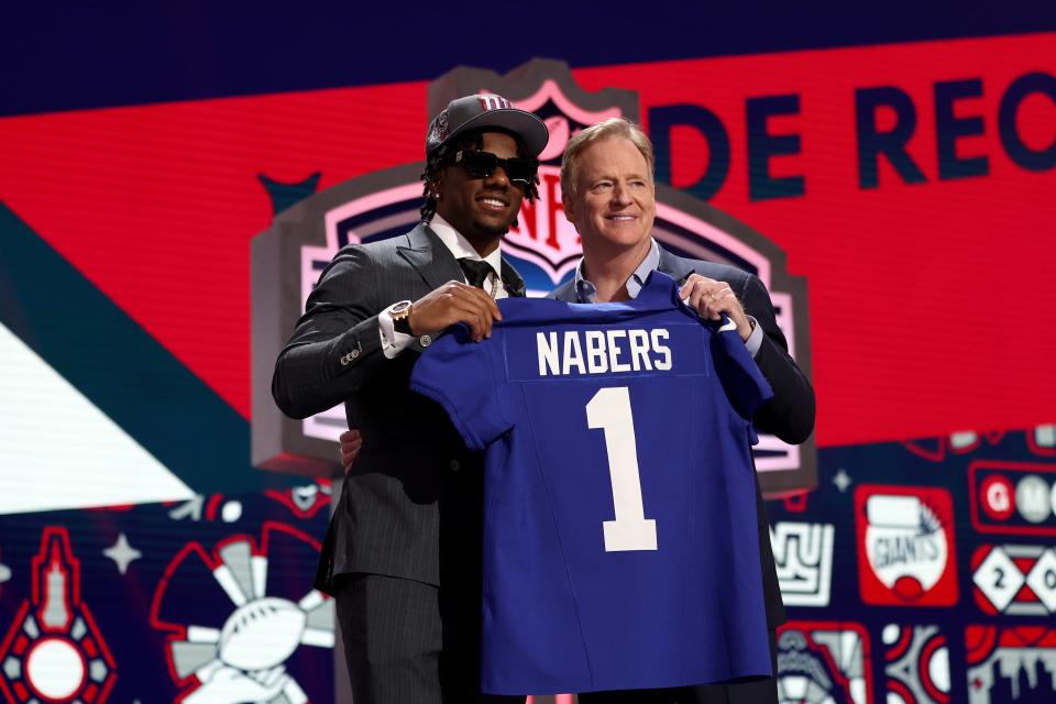DETROIT, MICHIGAN - APRIL 25: (L-R) Malik Nabers poses with NFL Commissioner Roger Goodell after being selected sixth overall by the New York Giants during the first round of the 2024 NFL Draft at Campus Martius Park and Hart Plaza on April 25, 2024 in Detroit, Michigan. (Photo by Gregory Shamus/Getty Images)
