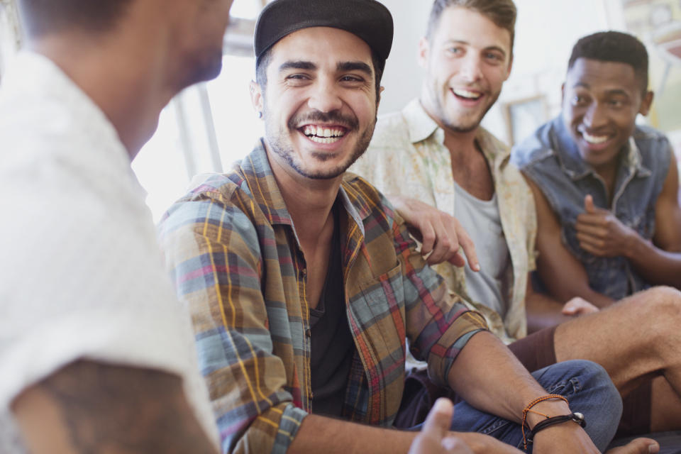 A group smile while having a conversation