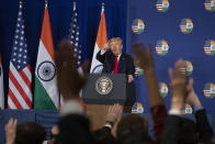 U.S.President Donald Trump points to a question during a news conference, Tuesday, Feb. 25, 2020, in New Delhi, India. (AP Photo/Alex Brandon)