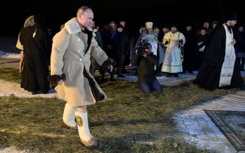 Vladimir Putin dip lake Orthodox Epiphany - Credit: Reuters