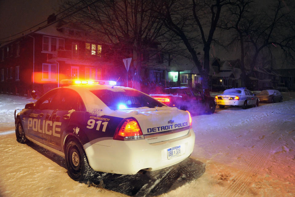 A Detroit Police vehicle is parked in the neighborhood where a four year old boy was shot with a rifle on Thursday, Jan. 16, 2014 in Detroit. A 4-year-old girl accidentally shot her 4-year-old cousin to death with a loaded rifle that she found under a bed at their grandfather's Detroit home, police said Friday. The girl was playing and watching TV on Thursday afternoon with the 4-year-old boy and his 5-year-old sister when she found the gun, police Sgt. Michael Woody said. He said she picked up the weapon, pointed it at the boy and shot him once in the chest. (AP Photo/Detroit News, Jose Juarez) DETROIT FREE PRESS OUT; HUFFINGTON POST OUT