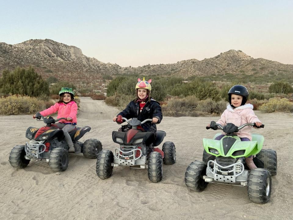 Rachel, Ashley and Dani riding their quad bikes in the desert in 2020 (Collect/PA Real Life)