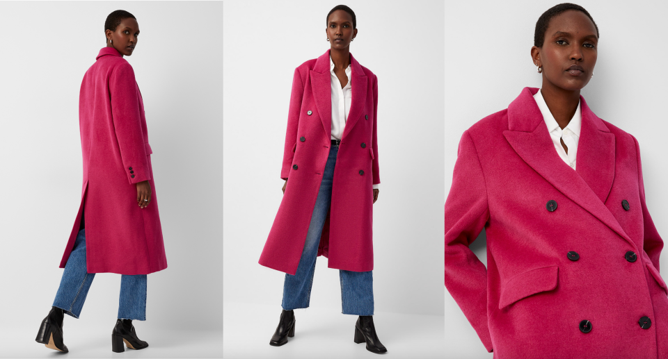 model wearing blue jeans, black heeled boots, white shirt and pink Soaked in Luxury Fia Fuchsia Double-Breasted Overcoat (photo via Simons)