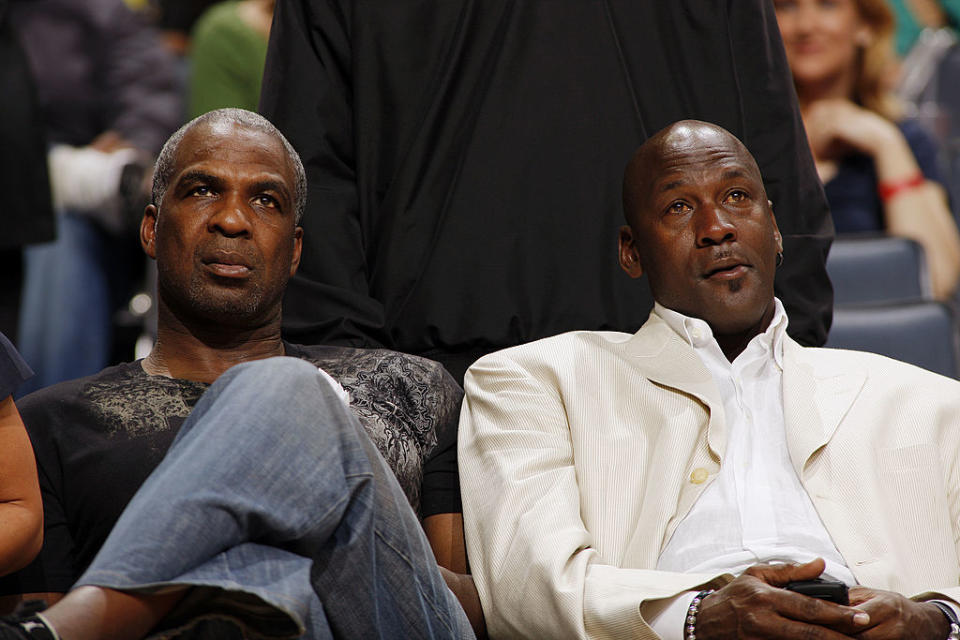 Charles Oakley and Michael Jordan are just thrilled. (Getty Images)