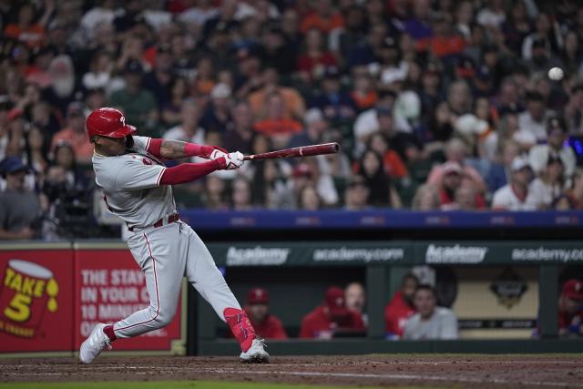 Philadelphia Phillies' Cristian Pache hits a RBI double against the Houston Astros during the fifth inning of a baseball game Friday, April 28, 2023, in Houston. (AP Photo/David J. Phillip)