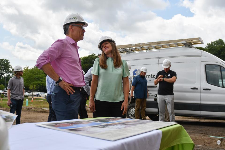Emma Henry, right, Executive Director of the Capital Area Housing Project, right, chats with former Labor Secretary Tom Perez, current Director of the White House Office of Intergovernmental Affairs, Tuesday, July 30, 2024, during a tour of the former Walter French Junior High School.