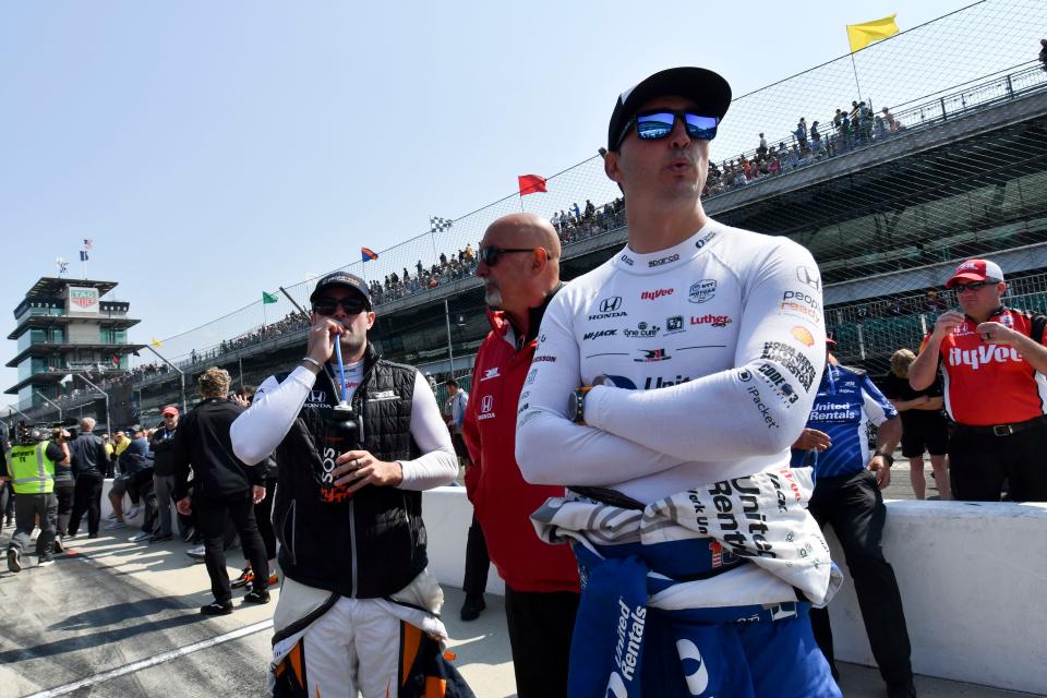 Rahal Letterman Lanigan Racing driver Jack Harvey (30) stands with Bobby Rahal and Rahal Letterman Lanigan Racing driver Graham Rahal (15) on Saturday, May 20, 2023, during first day of qualifying ahead of the 107th running of the Indianapolis 500 at Indianapolis Motor Speedway. 