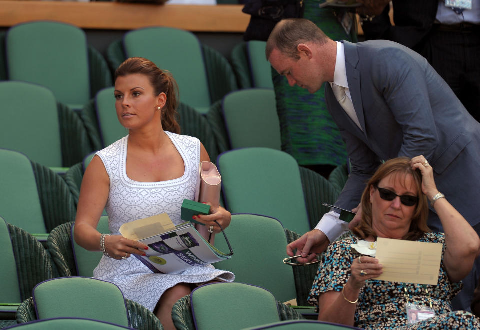 Wayne and Coleen Rooney in the royal box during day thirteen of the Wimbledon Championships at The All England Lawn Tennis and Croquet Club, Wimbledon.