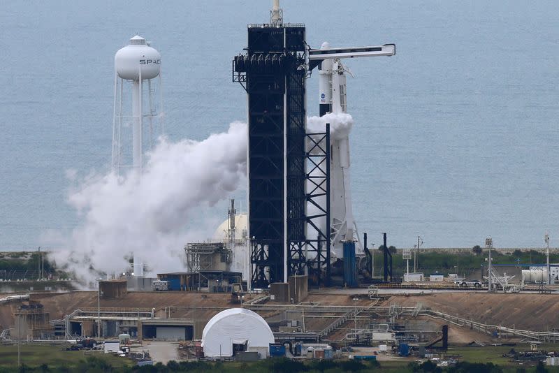 A SpaceX Falcon 9 rocket purges fuel after topping off before scheduled launch of NASA's SpaceX Demo-2 mission to the International Space Station from NASA's Kennedy Space Center in Cape Canaveral