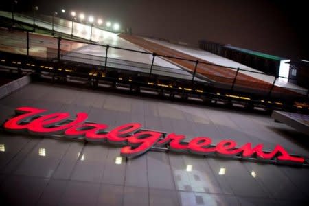 The logo of Walgreens is seen at their Times Square store in New York December 17, 2012. REUTERS/Andrew Kelly/File Photo