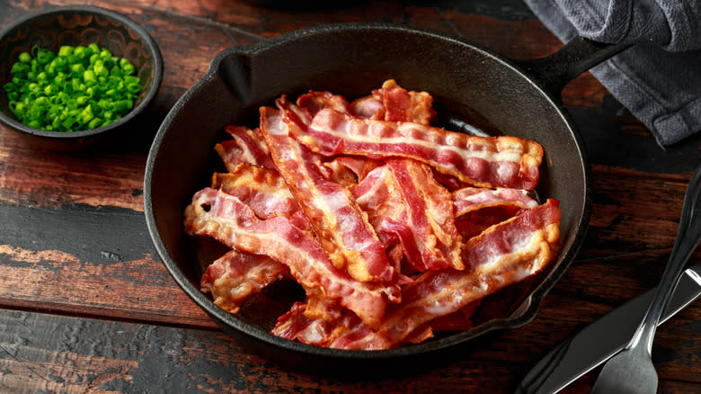 Skillet full of crispy bacon