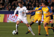 Soccer Football - Champions League - APOEL Nicosia vs Real Madrid - GSP Stadium, Nicosia, Cyprus - November 21, 2017 Real Madrid’s Cristiano Ronaldo in action with Apoel Nicosia’s Vinicius Junior REUTERS/Yiannis Kourtoglou