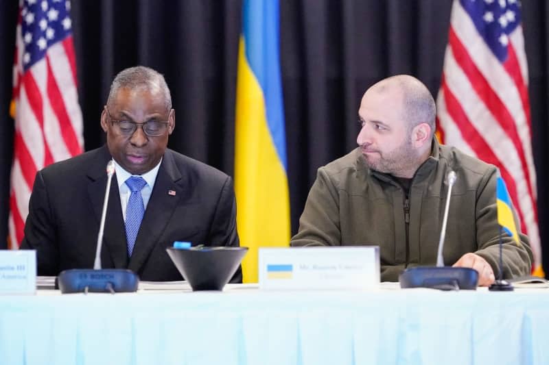 US Secretary of Defense Lloyd Austin (L) and  Ukrainian Defense Minister Rustem Umjerow attend the consultations of the US-led Ukraine Contact Group at Ramstein Air Base. Numerous defense ministers and high-ranking military officers are discussing further support for Ukraine in the war against Russia. Uwe Anspach/dpa