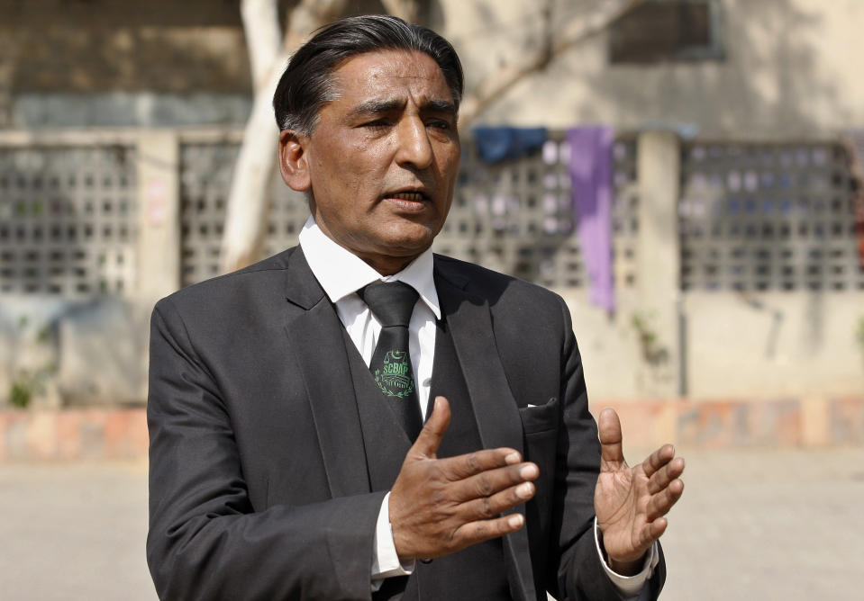 Nadeem Ahmed Aazer, defense lawyer of of British-born Pakistani Ahmed Omar Saeed Sheikh, talks to the media outside the Karachi Central Prison where Sheikh is detained, in Karachi, Pakistan, Friday, Jan. 29, 2021. Pakistan is scrambling to manage the fallout of a Supreme Court decision to free the Pakistani-British man accused in the 2002 beheading of American Journalist Daniel Pearl. The Sindh Provincial government on Friday filed a review petition, asking the same court to revisit its decision. (AP Photo/Fareed Khan)