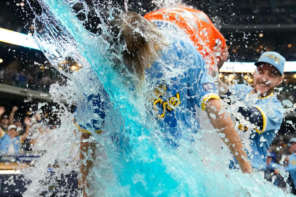 Caleb Boushley of the Milwaukee Brewers is doused after the Brewers defeated the Chicago Cubs, 4-3, at American Family Field on Friday night.