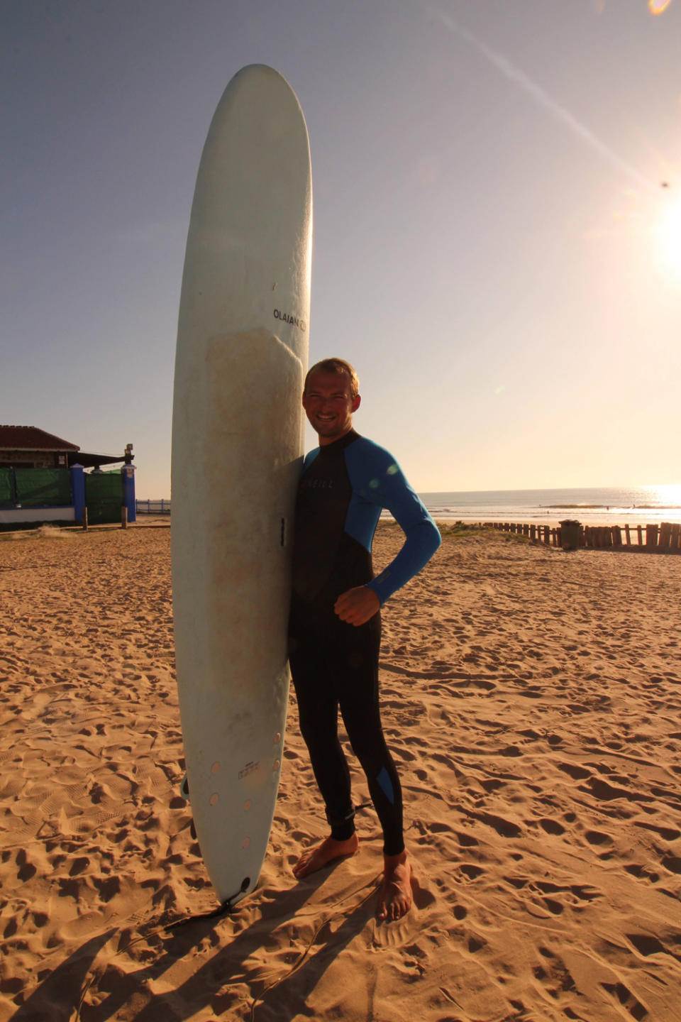 Kieran has learnt to surf since they started travelling in their van (Collect/PA Real Life)