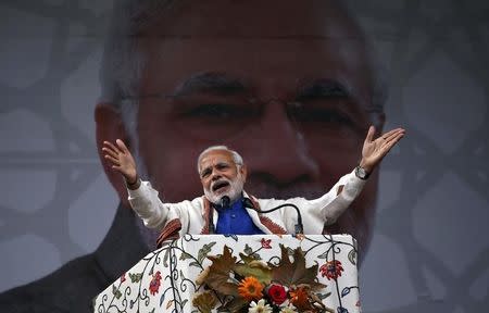 Prime Minister Narendra Modi addresses a rally in a cricket stadium in Srinagar, November 7, 2015. REUTERS/Danish Ismail