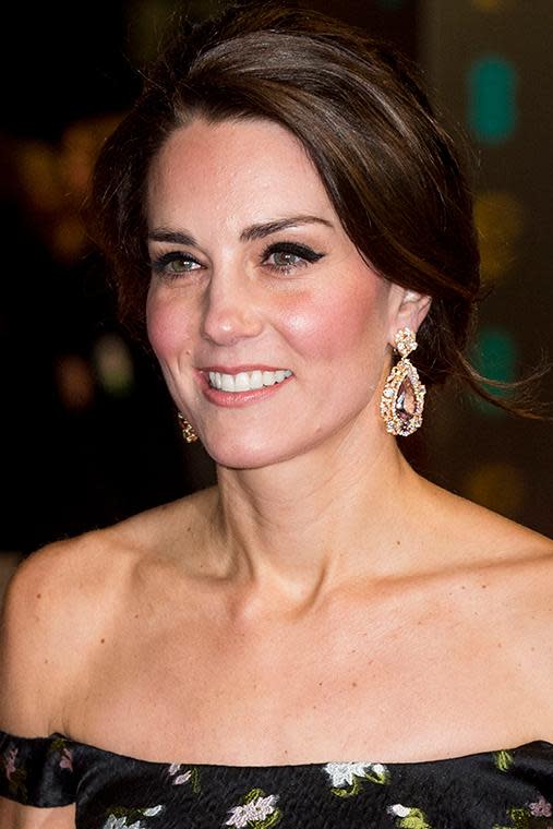 The Duchess showed up on the BAFTAs red carpet looking radiant with rosy cheeks, lashings of black eyeliner and a slick of plum lipgloss.