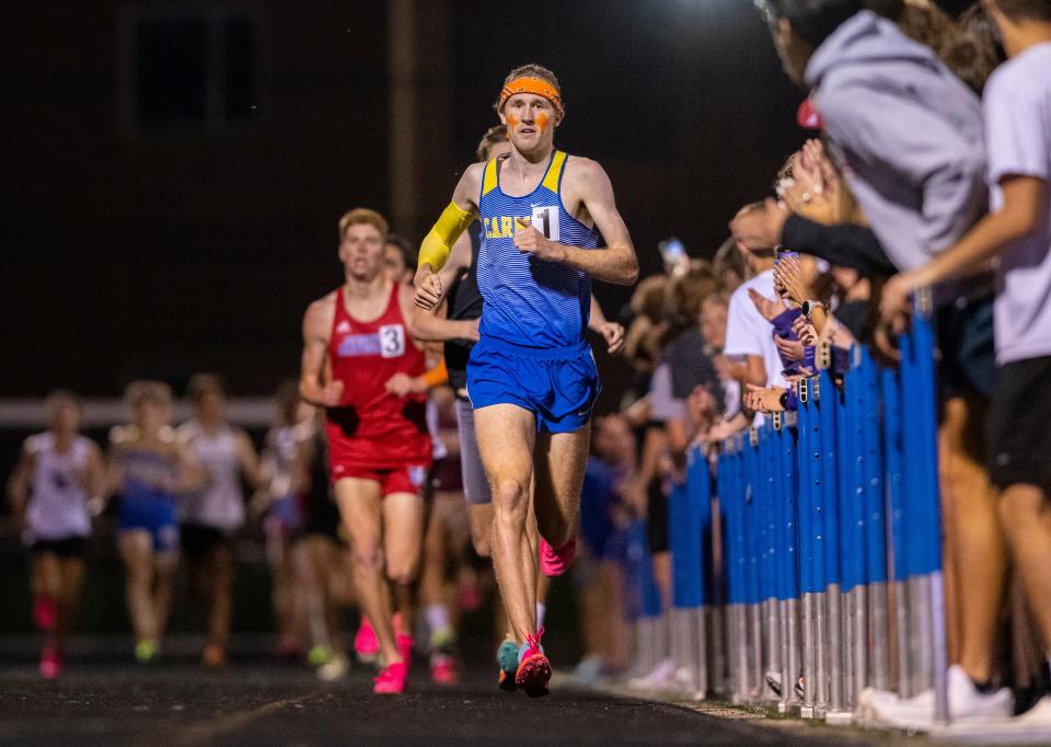 Carmel High School Kole Mathison leads during a Flashes Showcase Miracle Mile race, Friday, April 14, 2023, at Franklin Central High School in Indianapolis.