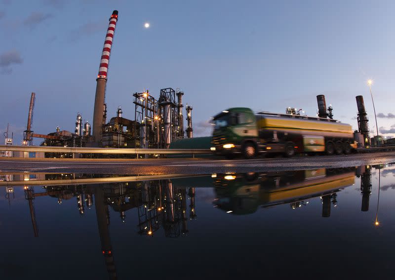 File photo of a truck driving past the Petroplus refinery in Cressier near Neuchatel