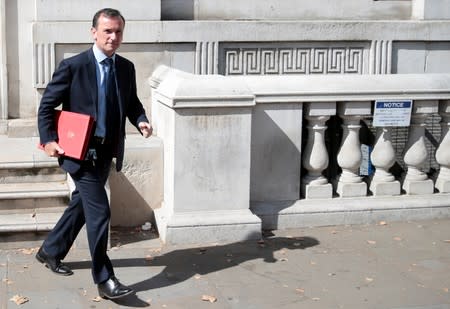 Secretary of State for Wales Alun Cairns leaves the Cabinet Office in London