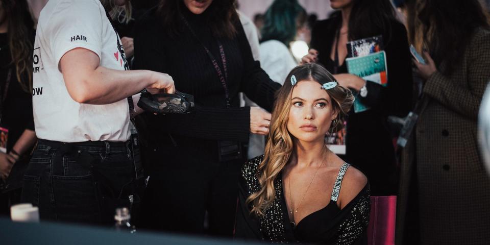 <p>Behati Prinsloo gets her hair done. </p>